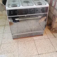 گاز ۵ شعله سالم فقط درش فنرش در رفته باید درست بشه