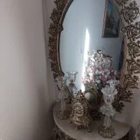 آینه و شمعدان وساعت