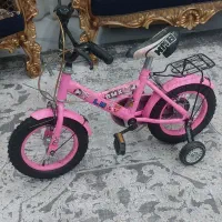 دوچرخه ۱۲ دخترانه صورتی در حد نو