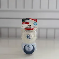 پستونک و شیشه شیر ناک