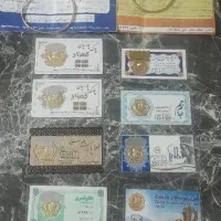 چند قطعه طلا ۲۰۰تومن هرگرم بالای تابلو