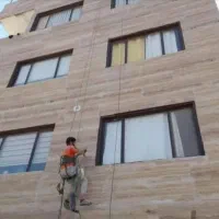 خدمات اجرای پیچ ورولپلاک سنگ نما رول پلاک ساختمان