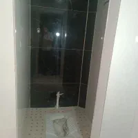 خرده کاری .تخریب کاشی‌کاری. بنای