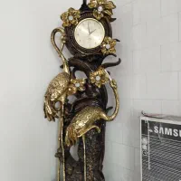 ساعت و زیر تلویزیون و تعدادی وسایل دیگر|مبلمان خانگی و میز عسلی|خرم‌آباد, |دیوار