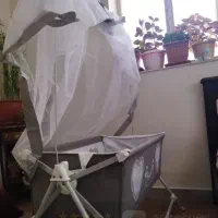 تخت گهواره ای نوزاد و صندلی کودک