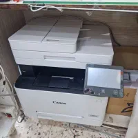 پرینتر کانن مدل mf655cdw در حد نو سالم و کم کار
