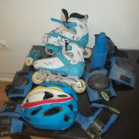 کفش اسکیت با تمامی لوازمش سالم ودر حد نو