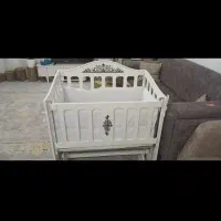 گهواره کنارتخت مادر