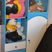 یک کمد بچه آبی و سفید رنگ ۷ در
