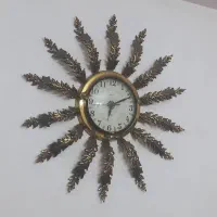 ساعت  دیواری برنز خورشیدی واقع در چهاردانگه