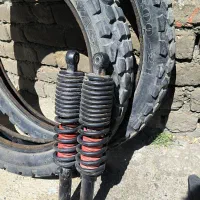 فروش ۲ لاستیک و کمک عقب برای تریل ایکسل . جفت کمک