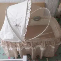 گهواره  کنار تختی
