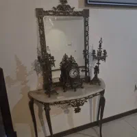 آینه کنسول و شمعدان و ساعت