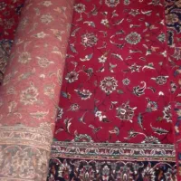 فرش 9 متری زمینه قرمز لاکی