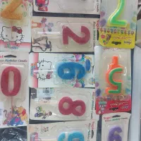 تعدادی شمع تولد عدد اکلیلی و...