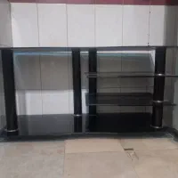 میز شیشه ای تلویزیون وتلویزیون ۲۴ اینچ پریما