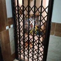 حفاظ درب اکاردئونی و میله ای لولایی کتابی باز شو|مصالح و تجهیزات ساختمان|گرمدره, |دیوار