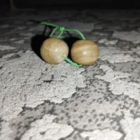 جفت مهره سلیمانی|کلکسیون اشیاء عتیقه|قم, نخودی|دیوار