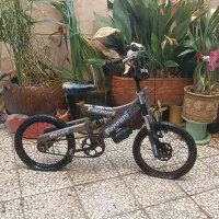 دوچرخه مشکی فراری سایز ۱۶ مارک فراری  دوچرخه فنری