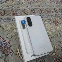 a56 رام 12 سکه مشابه آکبند