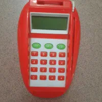 دستگاه کارتخوان ماشین حساب و عروسک