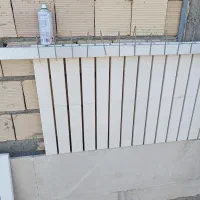 دوتا کارگر برای آجرنما