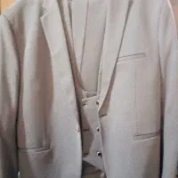 کت وشلوار وجلیقه