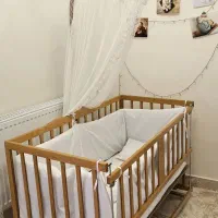 تخت کنار مادر گهواره ای