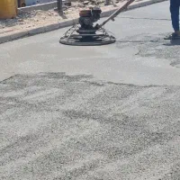 بتن ریزی دستی با خلاطه دیزل و ماله پروانه ای