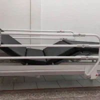 تخت سه شکن برقی