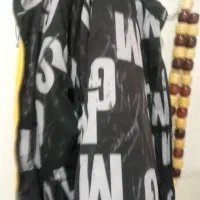 کاپشن|لباس|قم, شهید رجایی|دیوار