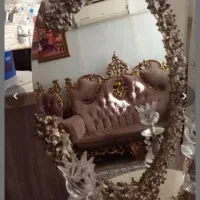 اینه وکنسول بادوعدد شمع دان کریستال