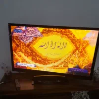 تلویزیون الجی ۵۵ اینج با میز وسینما خانواده