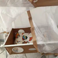 یک تشک بازی یک تشک استراحت و یک گهواره