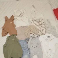 ۱۲ تکه لباس نوزاد ۶تا ۹ ماهه (رامپر و بادی)