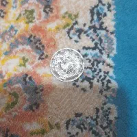 سکه زمان شیروخورشید یک ریالی