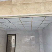 نصب سقف کاذب،قاب بندی ماربل شیت،قرنیز پارکت آیینه