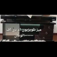بخاری و تلویزیون و میز تلویزیون