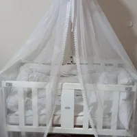 گهواره کنار تخت مادر