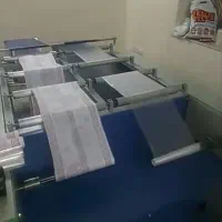 دستگاه دو لاین رول کننده سفره،و بسته بندی دستمال