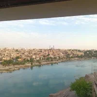زمین سمت دکل های برق کوپیته