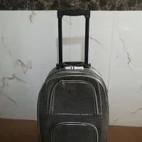 ساک مسافرتی و رمزدار و دارای چرخ
