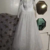 لباس عروس|لباس|رباطکریم, کیکاور|دیوار