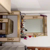 تخت خواب و میز آرایشی و صندلی
