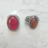 دو انگشتر استیل با سنگ شجر و سنگ مواد مذاب
