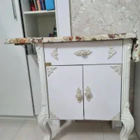 میزاتو و چرخ خیاطی