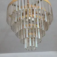 ۳عدد لوستر و یک عدد ساعت دیواری