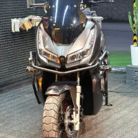 adv همتاز