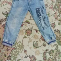 تعدادی شلوار جین پسرانه پیراهن پسرانه