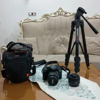 دروبین حرفه ای کنون 1300D کم کارکرد با لوازم جانبی